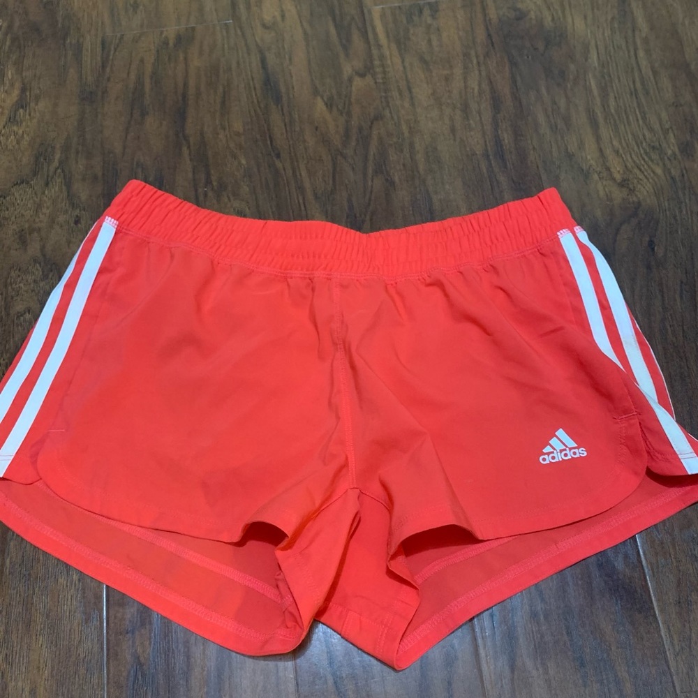 Coral color Adidas shorts